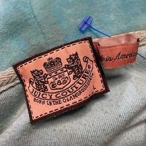 Y2K inspired Juicy Couture baby blue track jacket.